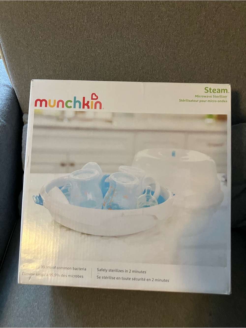 Never Used, Brand NewMunchkin Microwave Steam Sterilizer - White with Light Blue